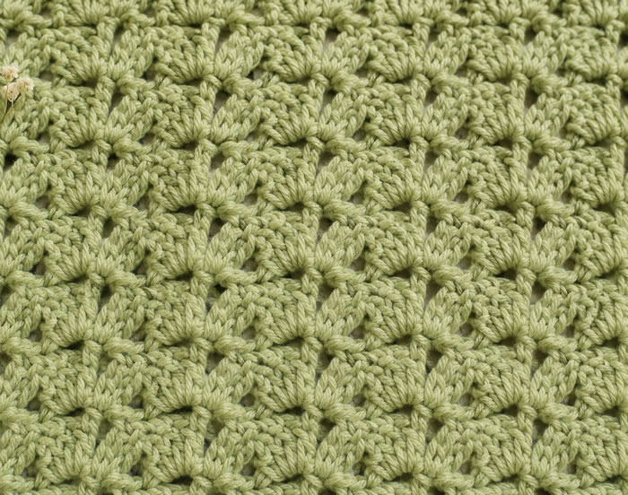 Muestra de punto de crochet en verde salvia